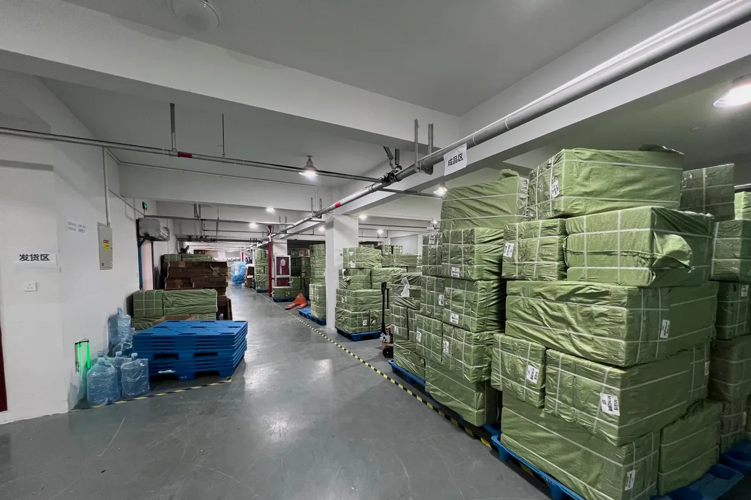 Shipping area with pallets of packed orders ready for worldwide dispatch